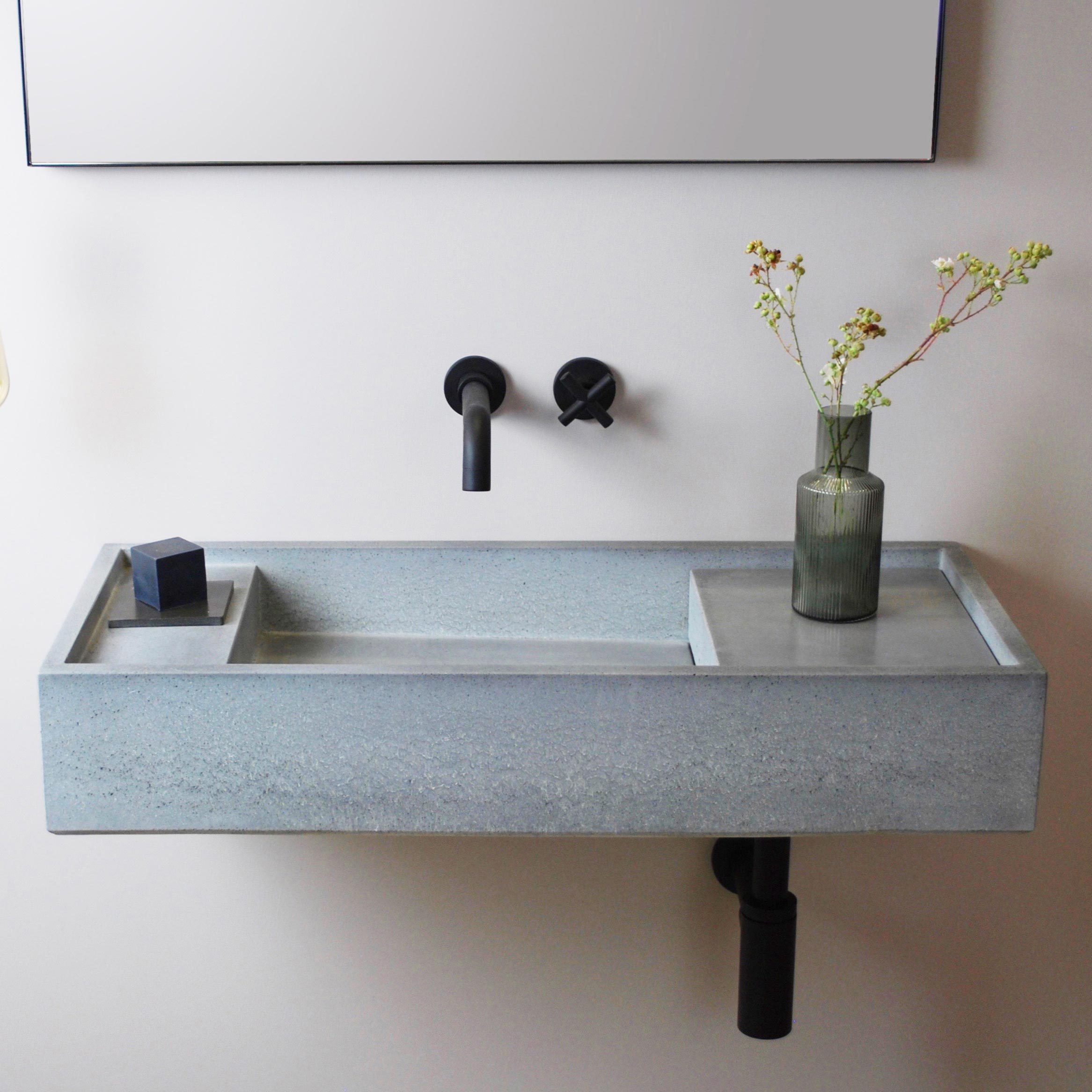 Dami modular concrete vanity basin with asymmetrical shelf design