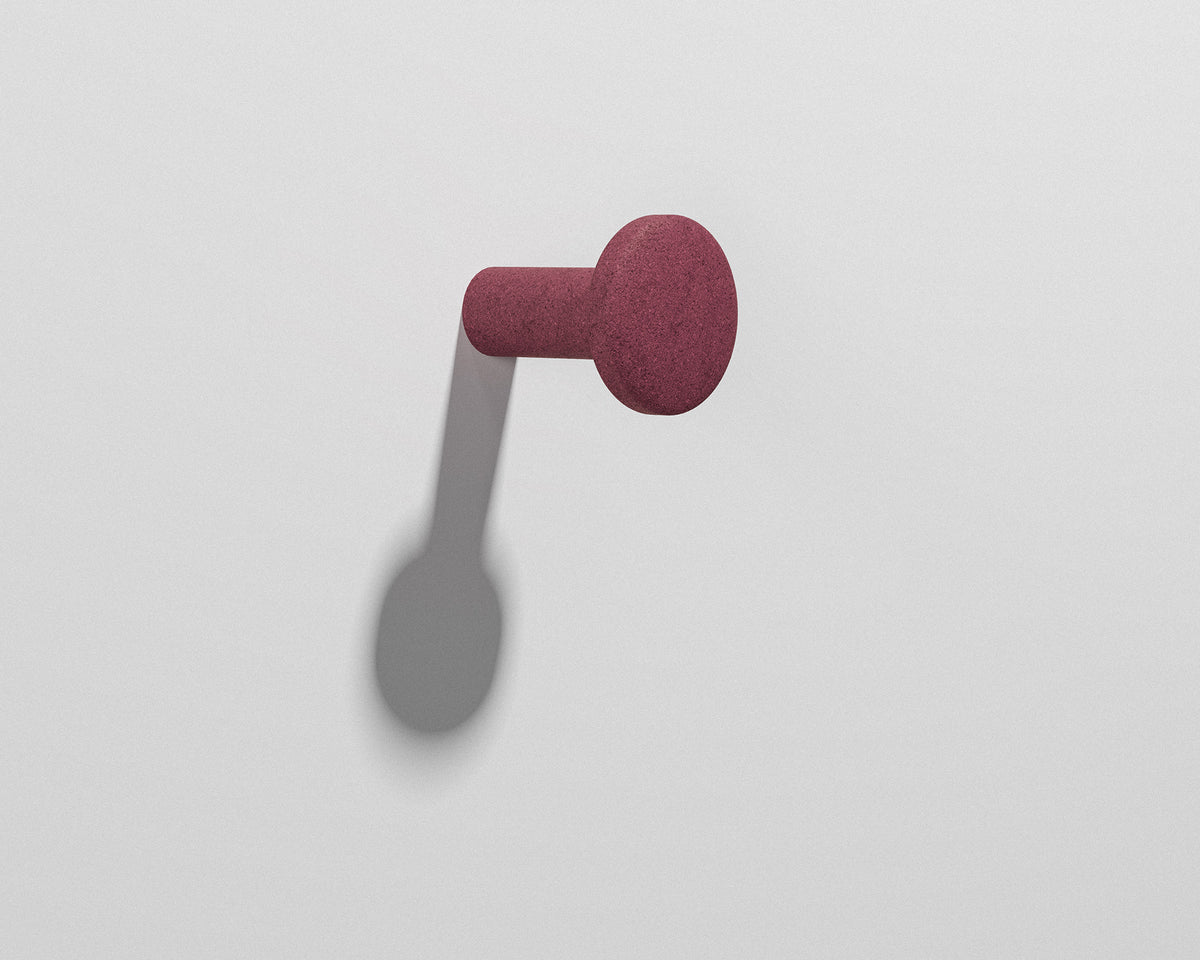FORMED Hook Small sculptural concrete wall hook in a contemporary interior