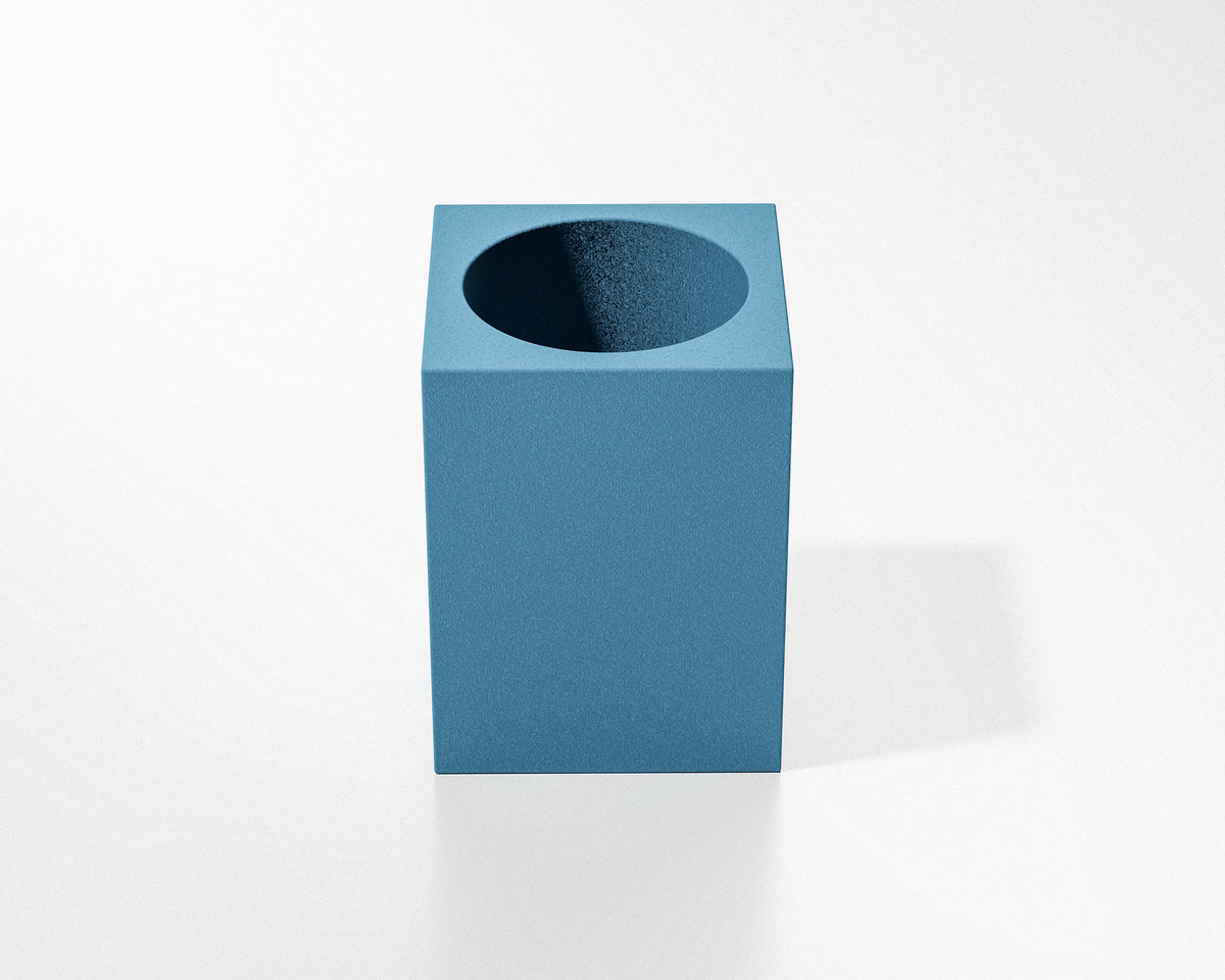 FORMED Squared Circle sculptural concrete pot in a contemporary bathroom