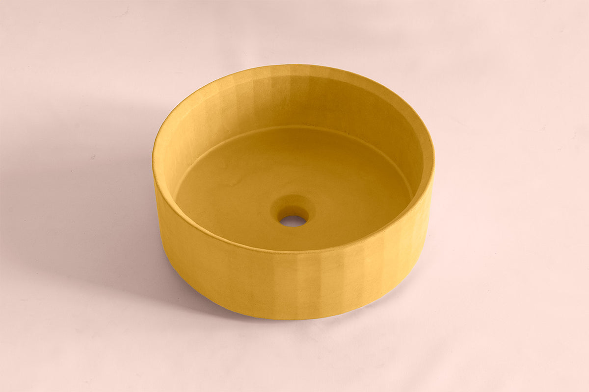Facet sculptural concrete bowl basin with geometric faceted surface