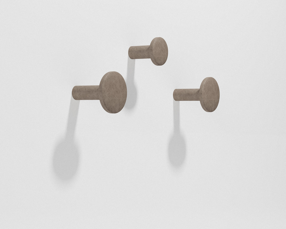 FORMED Hook Large sculptural concrete wall hook in a contemporary interior