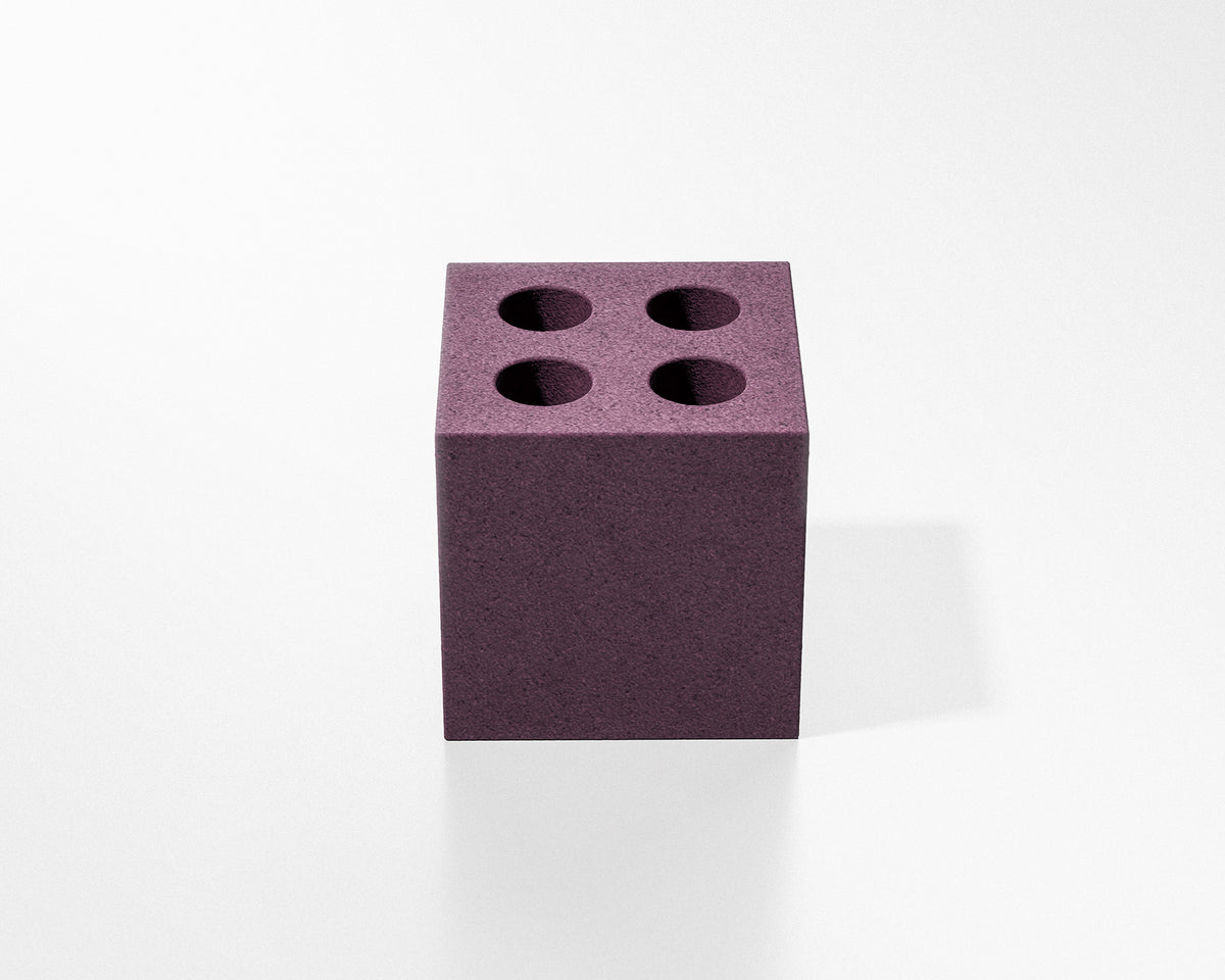 FORMED Silo sculptural concrete toothbrush holder in a contemporary bathroom