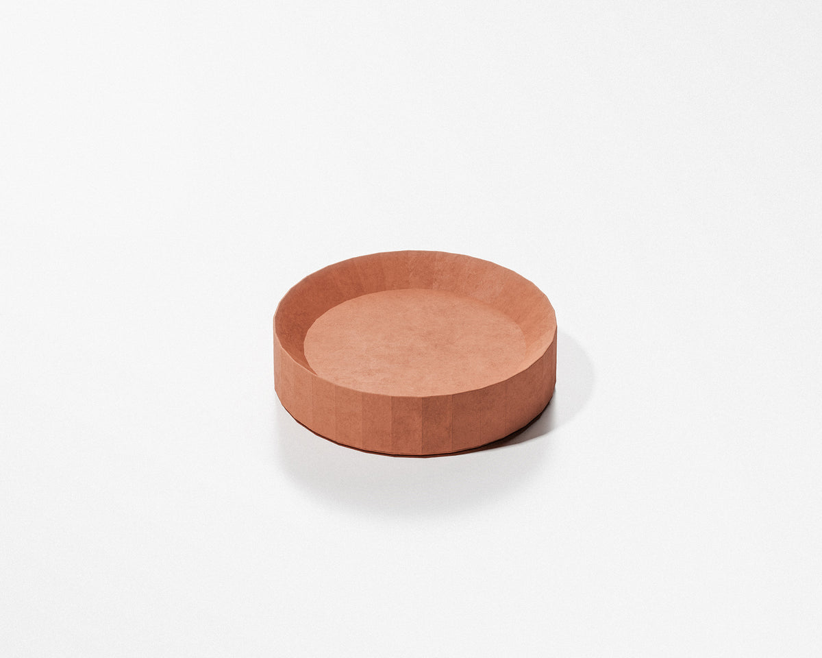FORMED Facet Dish concrete bathroom accessory in a contemporary bathroom