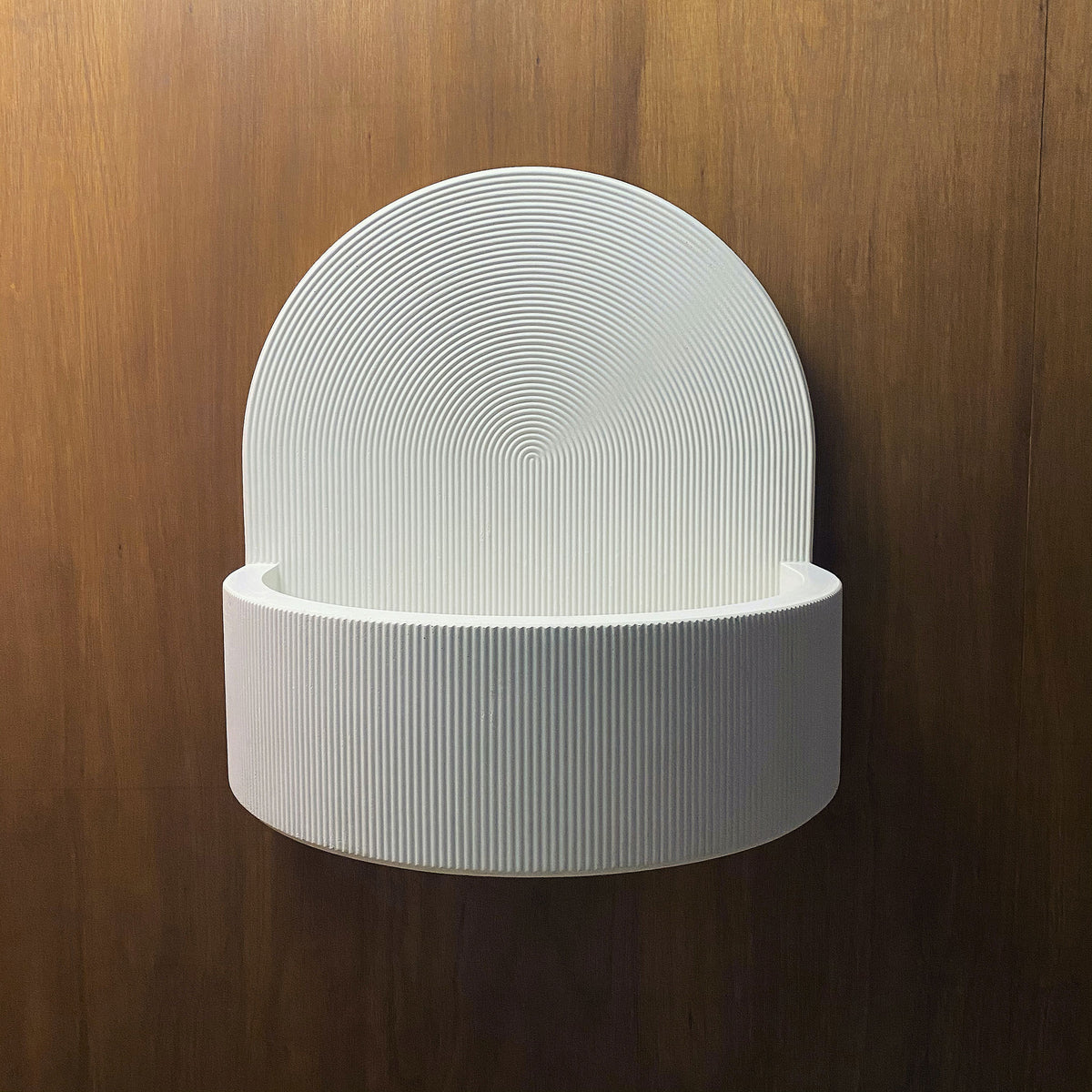 Koro ribbed concrete bathroom basin with integrated splashback