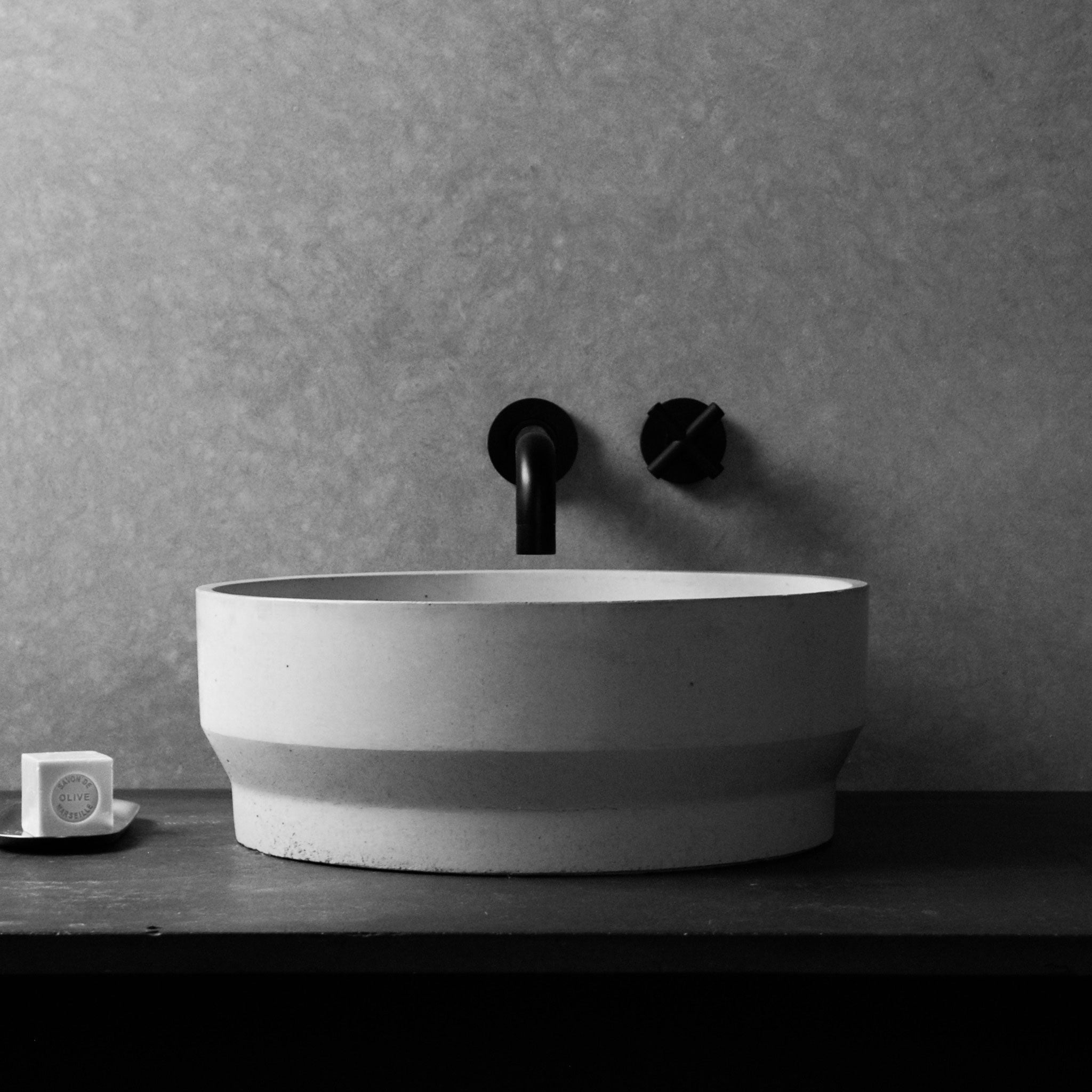 Myla round concrete bathroom basin with angled industrial form